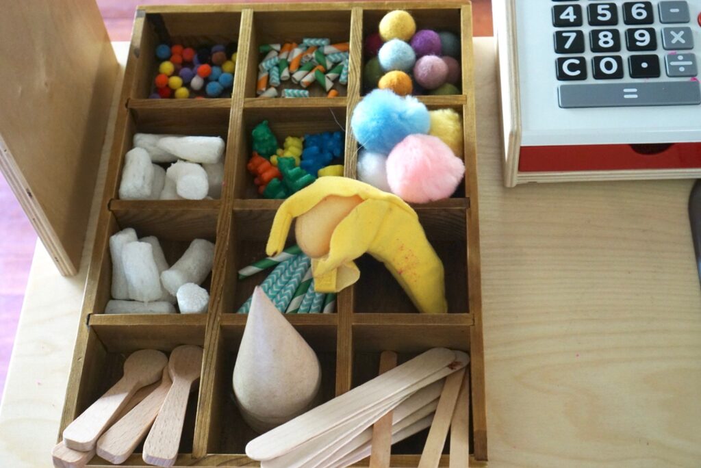 IKEA kitchen ice cream shop hack 16 IKEA duktig mini-kitchen ice cream shop, cafe striped awning, lemonade stand, bodega, farmer's market, food stand hack makeover tutorial DIY, chalkboard paint, dramatic play pretend
