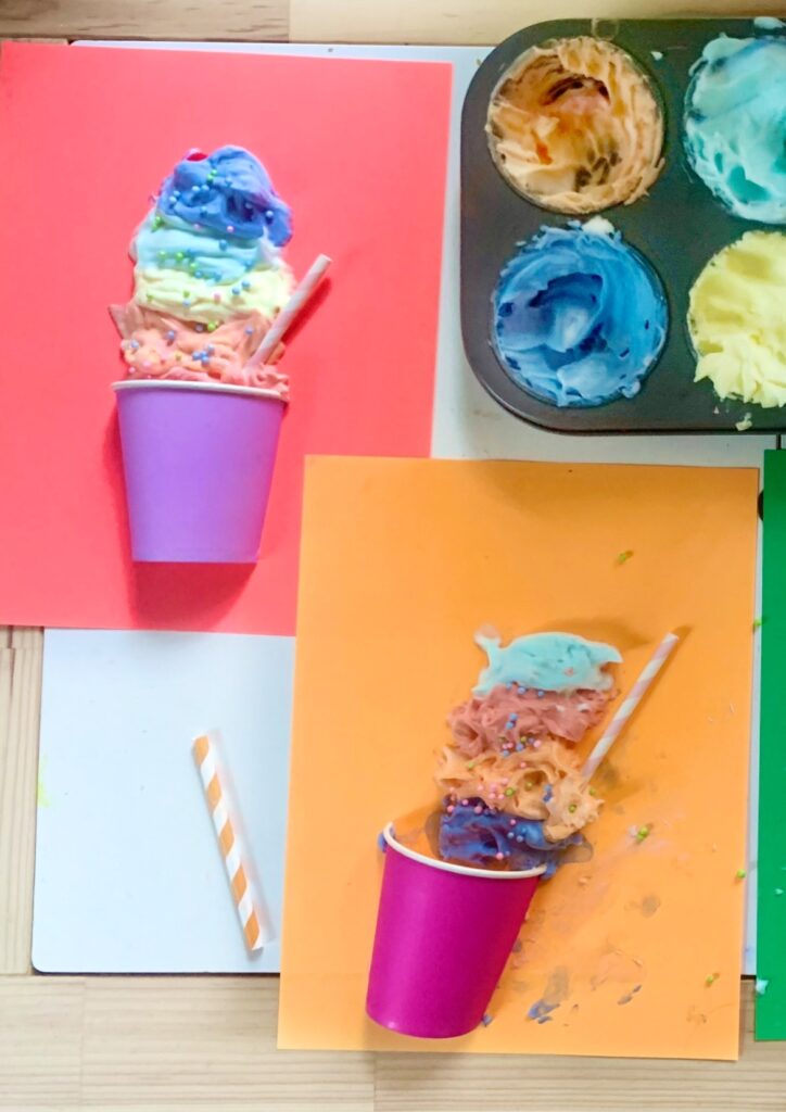 Paper cups filled with colorful puffy paint gelati ice cream + sprinkles with a straw. Kids Process Art Activity